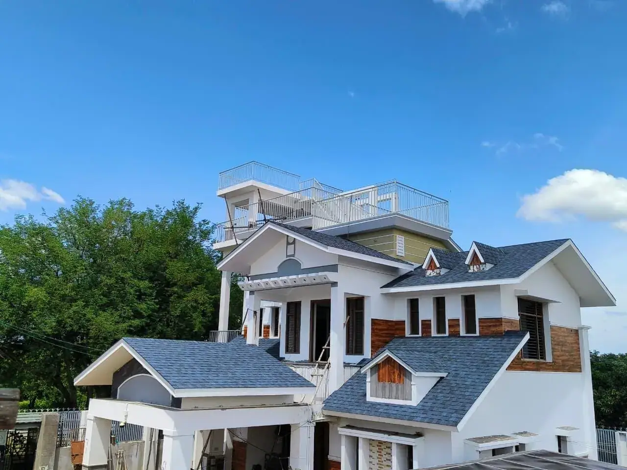 Modern house with premium roofing shingles in Coimbatore
