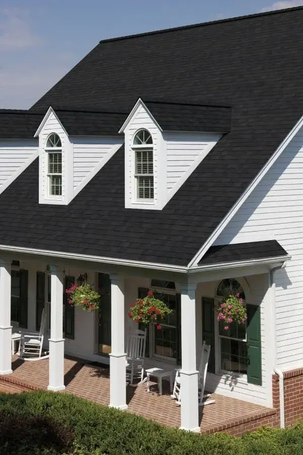 Black Saint Gobain asphalt roofing shingles on a Coimbatore house